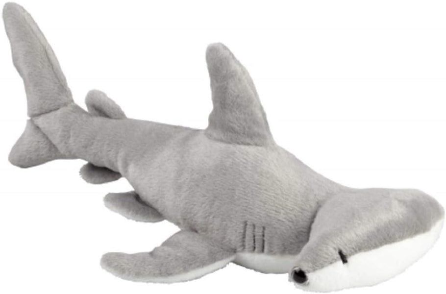 Gray shark plush toy on a white background