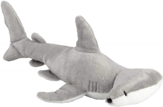 Gray shark plush toy on a white background