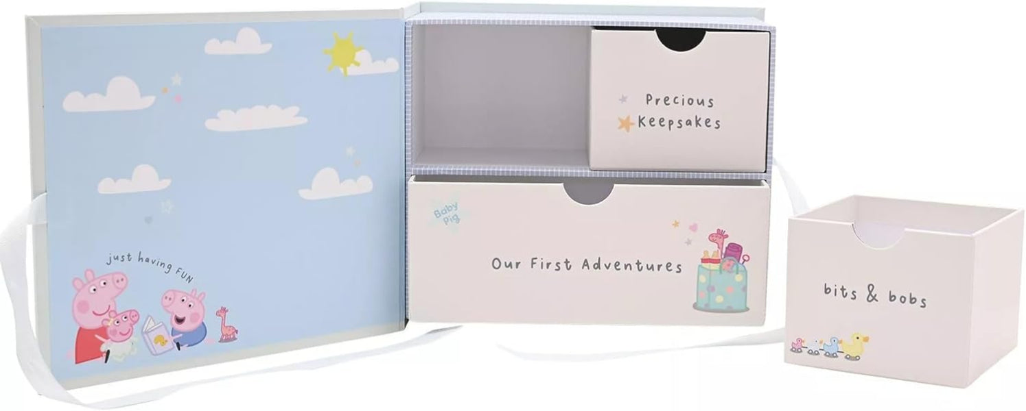 Set of baby-themed boxes with cartoon designs and text.
