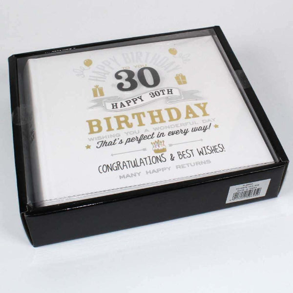 Box with a birthday card inside on a white background