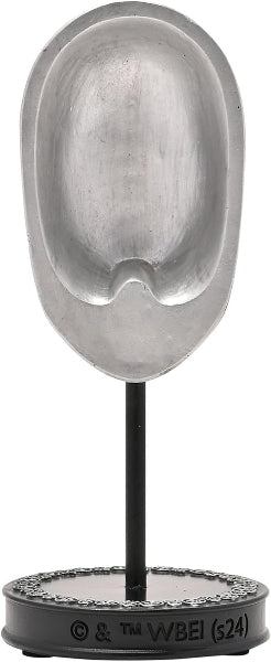Metallic urn-shaped object on a stand with 'WEE' branding