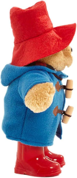 Toy figure of a character wearing a red hat, blue coat, and red boots.