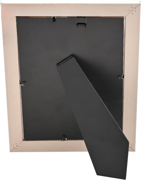 The back view of a square picture frame with a light beige wood-grain border and a black metal backing board and stand, isolated on a white background.