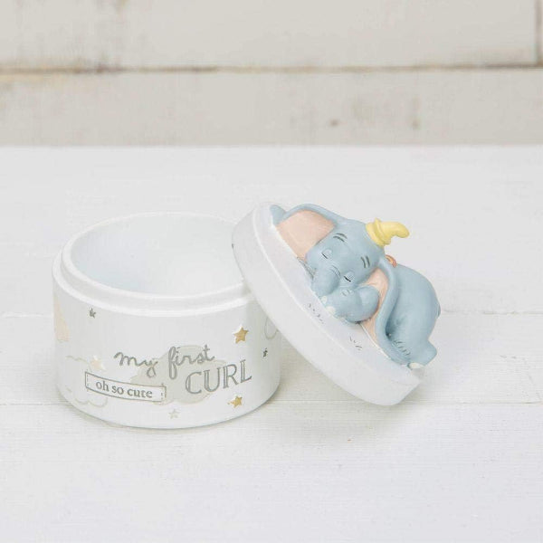 Small elephant figurine in a decorative box with 'my first curl oh so cute' text on a white background