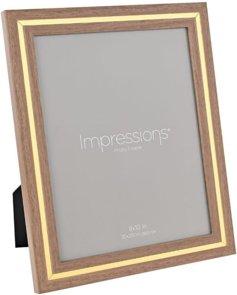 Wooden picture frame with gold accents and 'Impressions' branding on a white background
