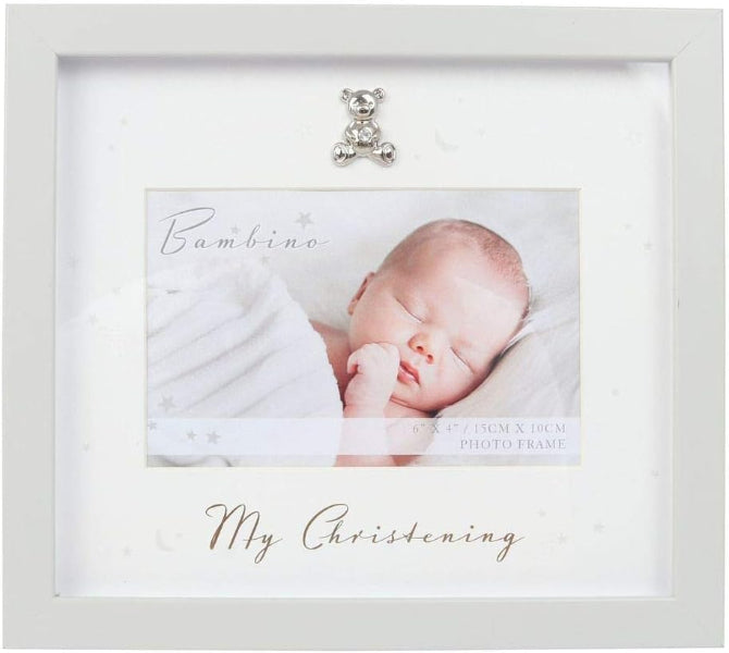 White photo frame with a baby photo and decorative bear charm on a white background