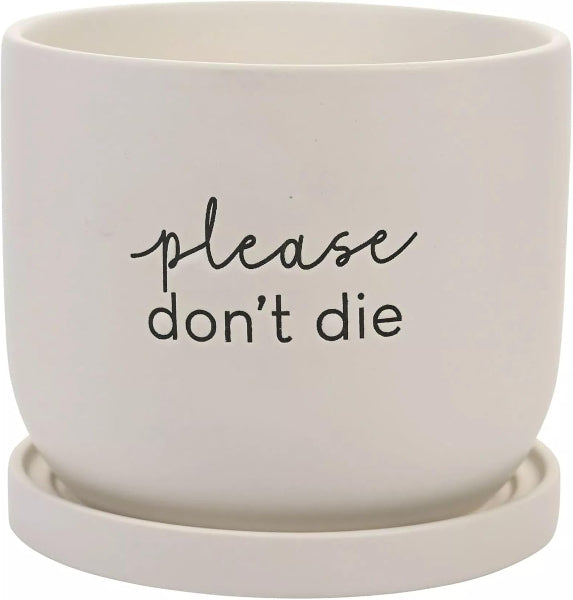 White ceramic pot with 'please don't die' text on a white background