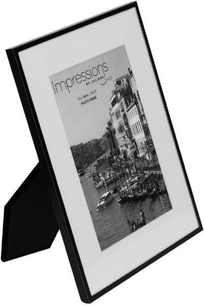 Black photo frame with a scenic print on a white background