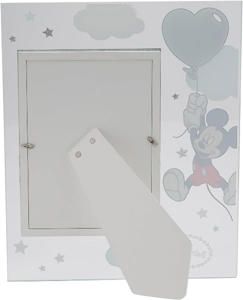 Decorative wall panel with cartoon character, balloons, and cloud designs on a light gray background.