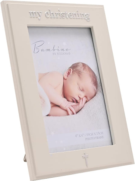 An off-white wooden baby christening picture frame with 'my christening' embossed at the top and a small cross at the bottom, holding a photo of a sleeping newborn baby.