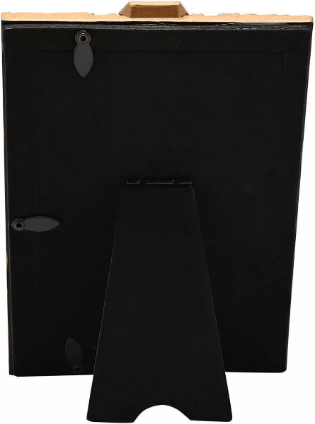 Black metal stand with wooden top on a white background