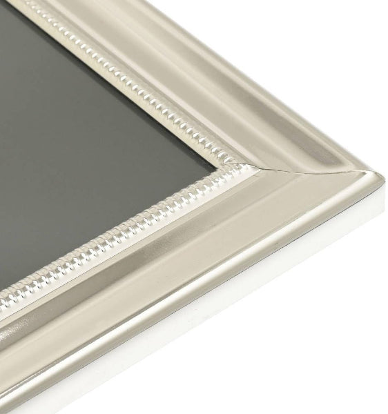 Close-up of a decorative silver frame on a white background