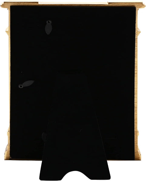 Black rectangular object with gold frame on a white background