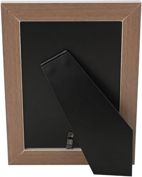 Black tie inside a wooden frame on a white background