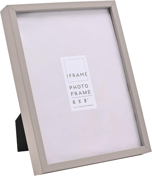 A 6x8 inch picture frame with a light beige wood finish and a black metal easel stand, shown on a white background.