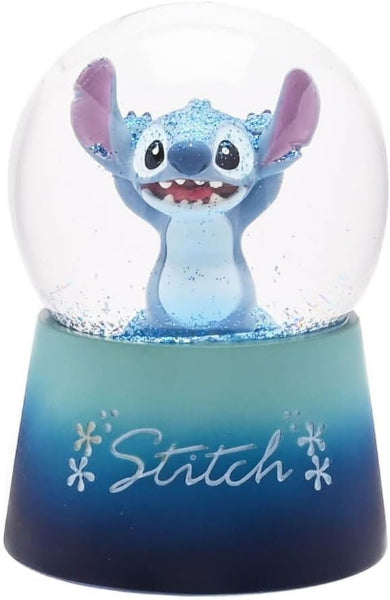 Snow globe with a character inside on a blue base, featuring the word 'Stitch'.