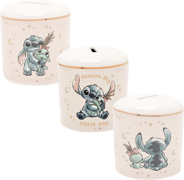 Three cylindrical piggy banks with white lids and pastel illustrations of Stitch and Angel, decorated with gold-toned text and crescent moon motifs on a white background.