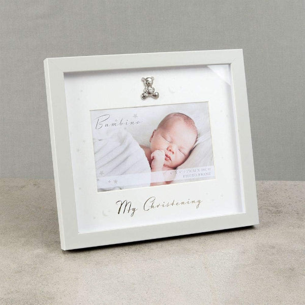 White photo frame with a baby picture and 'My Christening' text on a gray background