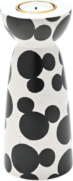 Ceramic oil diffuser with black circular pattern on a white background