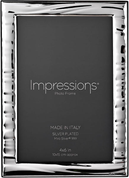 Silver photo frame with 'Impressions' branding on a black background