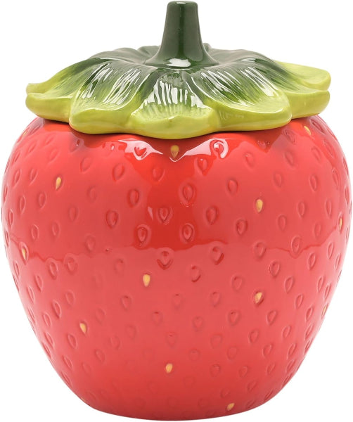 Ceramic strawberry-shaped container with green lid on a white background