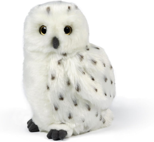 Plush toy owl with white fur and black spots on a white background