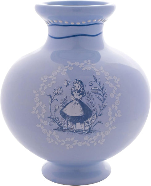 Blue ceramic vase with decorative design on a white background