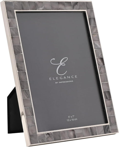 A 5x7 inch picture frame with a silver-toned metallic border and a gray mosaic tile pattern, shown standing on a black display base against a white background.