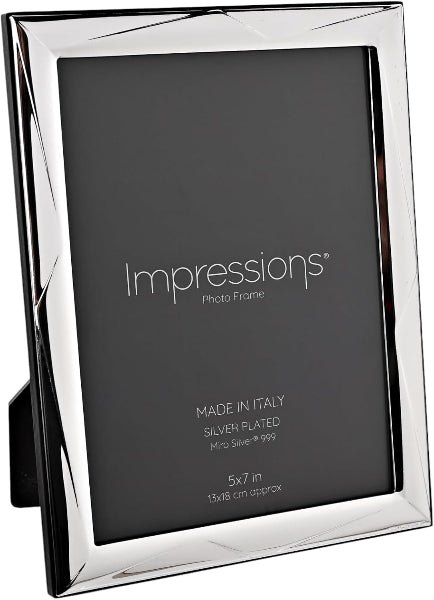 Silver photo frame with 'Impressions' branding on a black background
