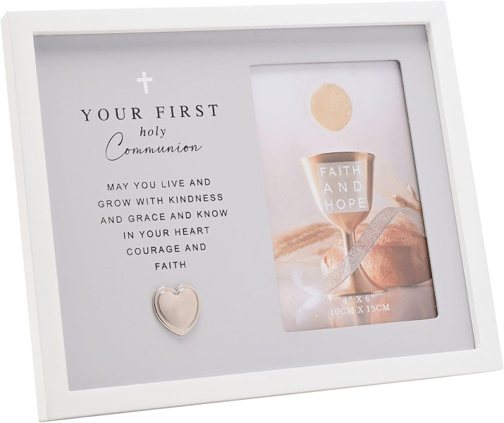 White frame with 'Your First Holy Communion' message and heart-shaped object inside