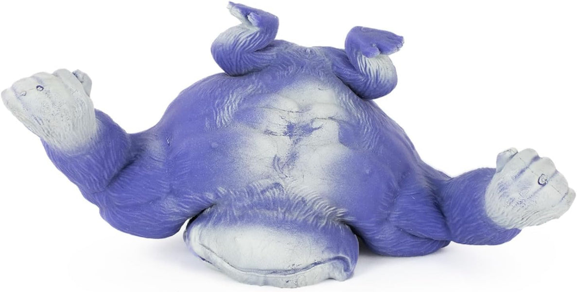 Purple and gray dinosaur-like creature on a white background