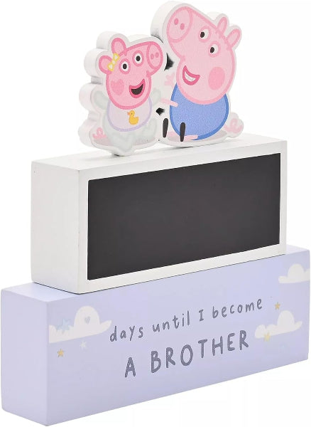 Decorative box with Peppa Pig figurines and text 'days until I become a brother' on a white background