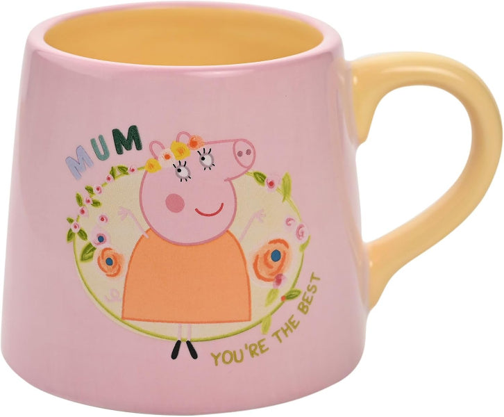 Pink mug with a cartoon character and text on a white background