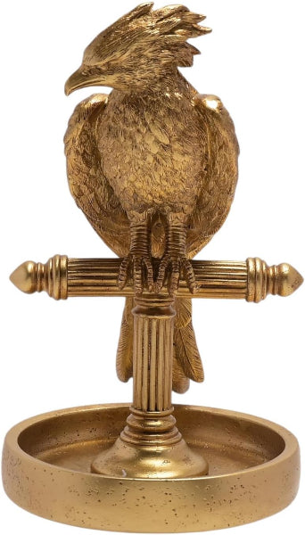 Decorative brass eagle on a stand with a circular base