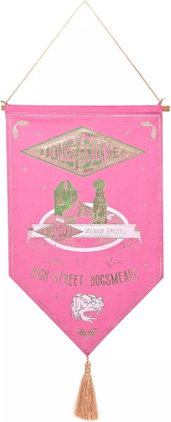 Pink banner with green and white text and graphics, hanging against a white background.