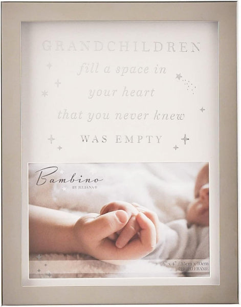 A square light beige photo frame with a custom printed insert. The insert features the text 'GRANDCHILDREN fill a space in your heart that you never knew WAS EMPTY' in a delicate gray font, decorated with small star and cross motifs.