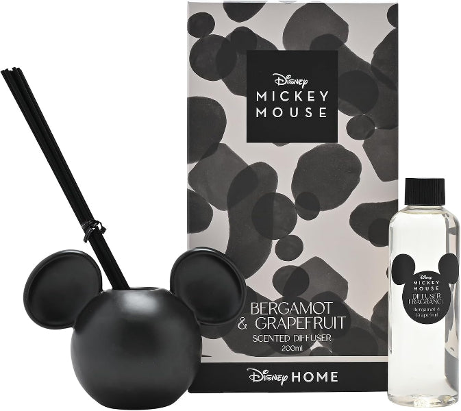Disney Home Mickey Mouse Bergamot & Grapefruit scented diffuser set, including a black Mickey-shaped diffuser bowl with a black reed, a clear bottle of water with a black Mickey logo, and a patterned product box.