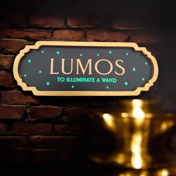 Warner Bros Harry Potter Alumni Spell Lumos Sign