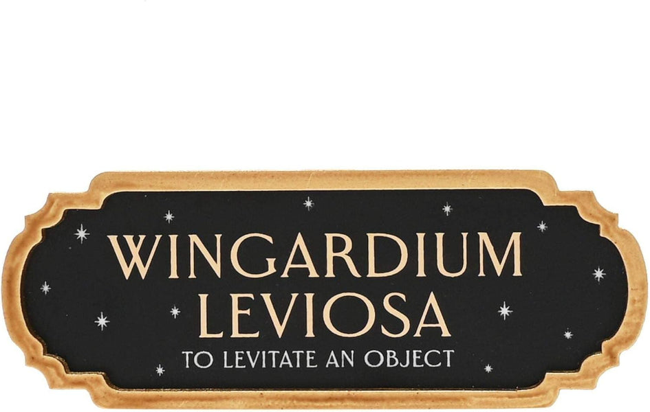 Decorative sign with 'Wingardium Leviosa' text on a black background