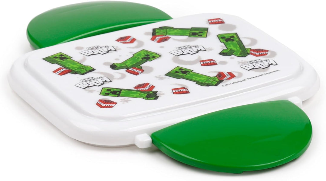 Green and white toy with character designs on a white background