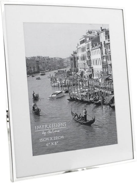 Silver photo frame with a scenic view of a canal and buildings.