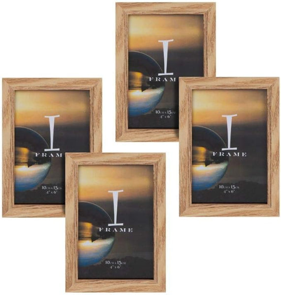 Set of four wooden picture frames with a sunset design on the glass.