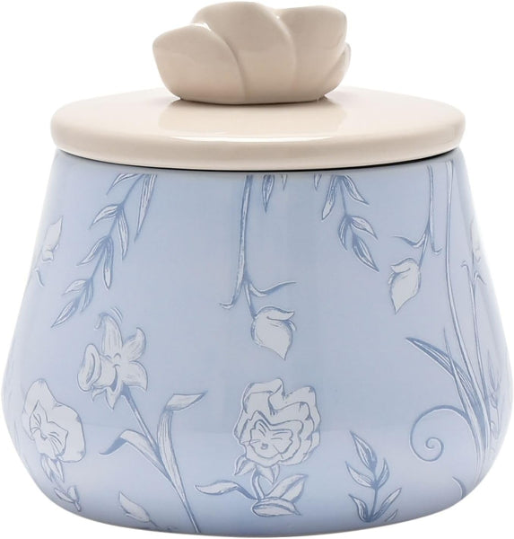 Ceramic jar with floral design and light blue color on a white background