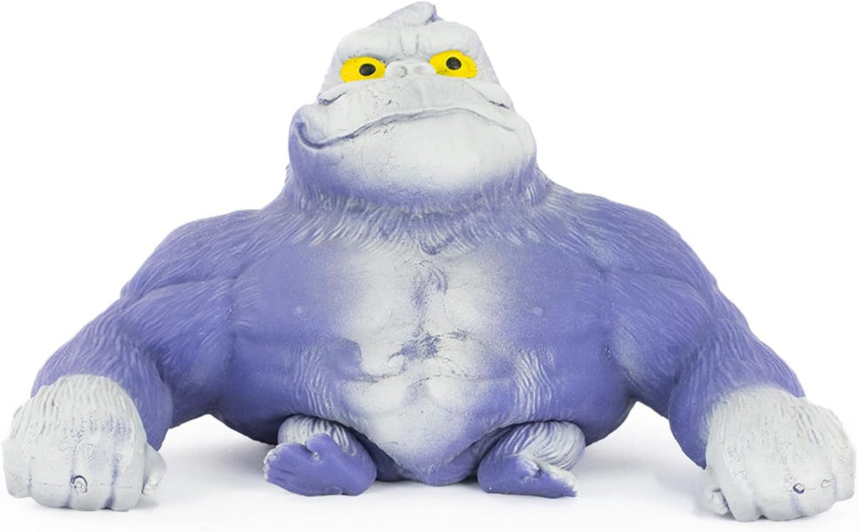 Purple and white creature with yellow eyes on a white background