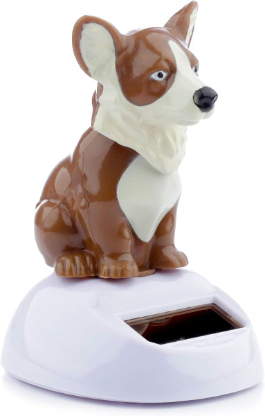 Dog-shaped solar car ornament on a white background