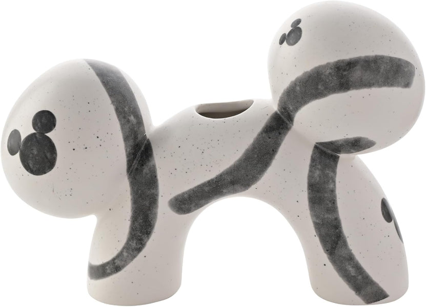 White and vase with black accents on a white background