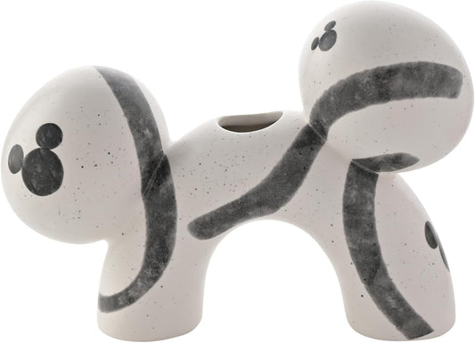 White and vase with black accents on a white background