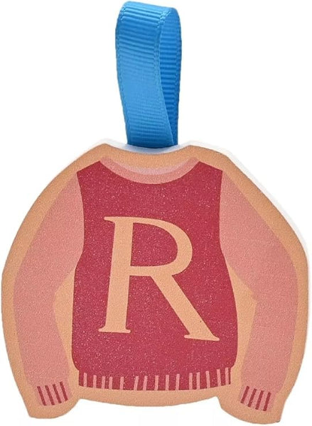 Decorative ornament shaped like a sweater with a letter 'R' on a white background