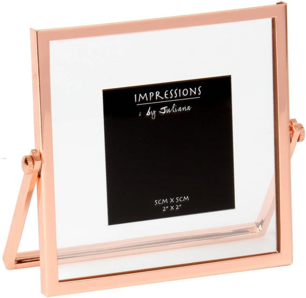 Rose gold photo frame with white mat and black label on a white background