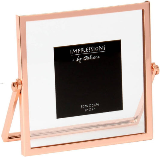 Rose gold photo frame with white mat and black label on a white background